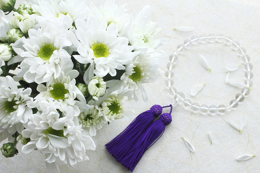 Chrysanthemum bouquet and rosary